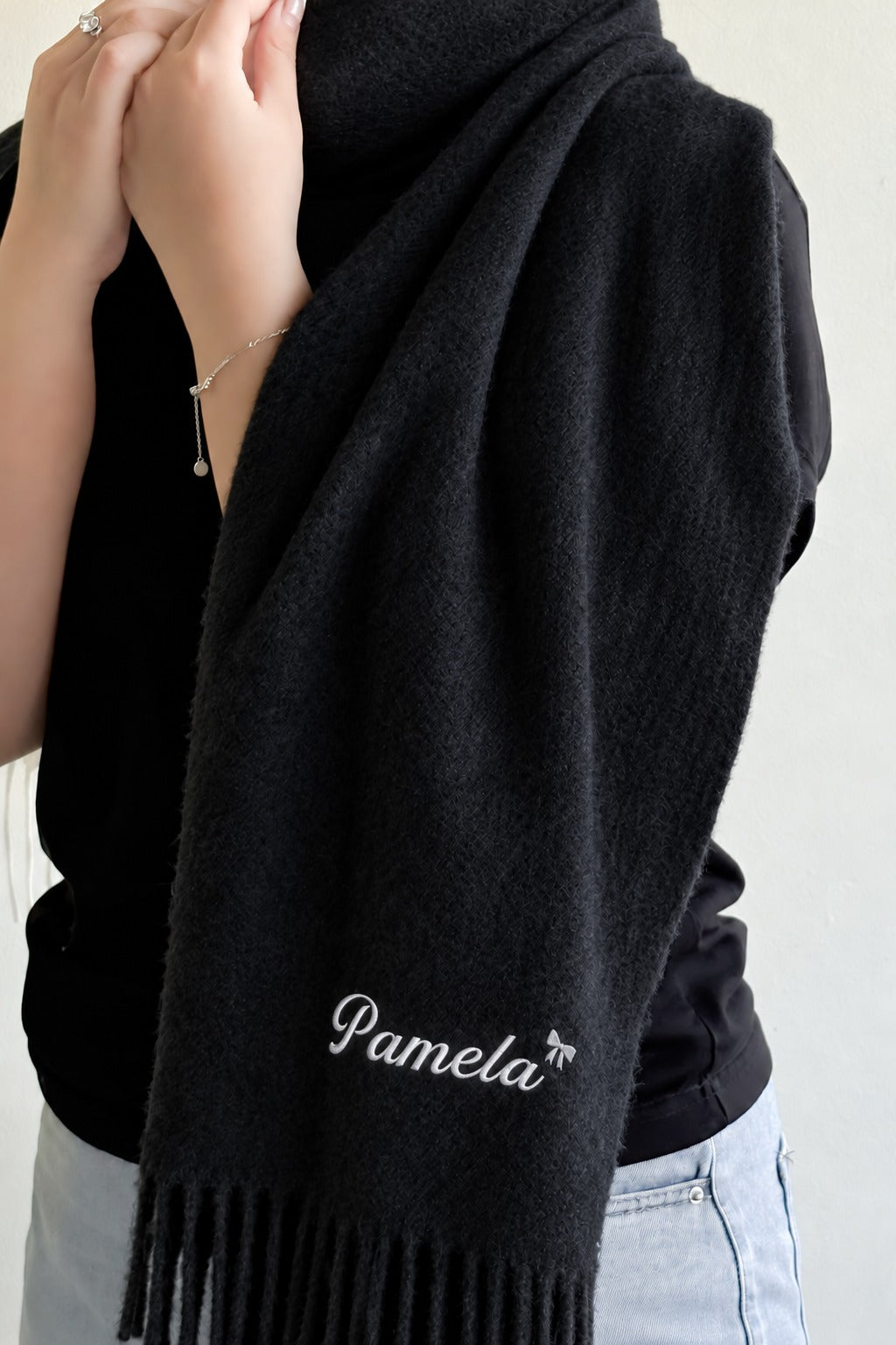 Khăn choàng đen thêu tên Pamela + icon nơ, chỉ trắng – Fringe Scarf - Dear eM