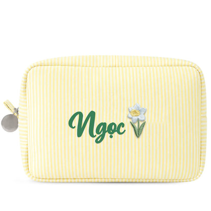 Candy Stripe Pouch Big vàng thêu tên Ngọc + hoa thuỷ tiên trắng tháng 12 (ảnh minh hoạ) - Dear eM